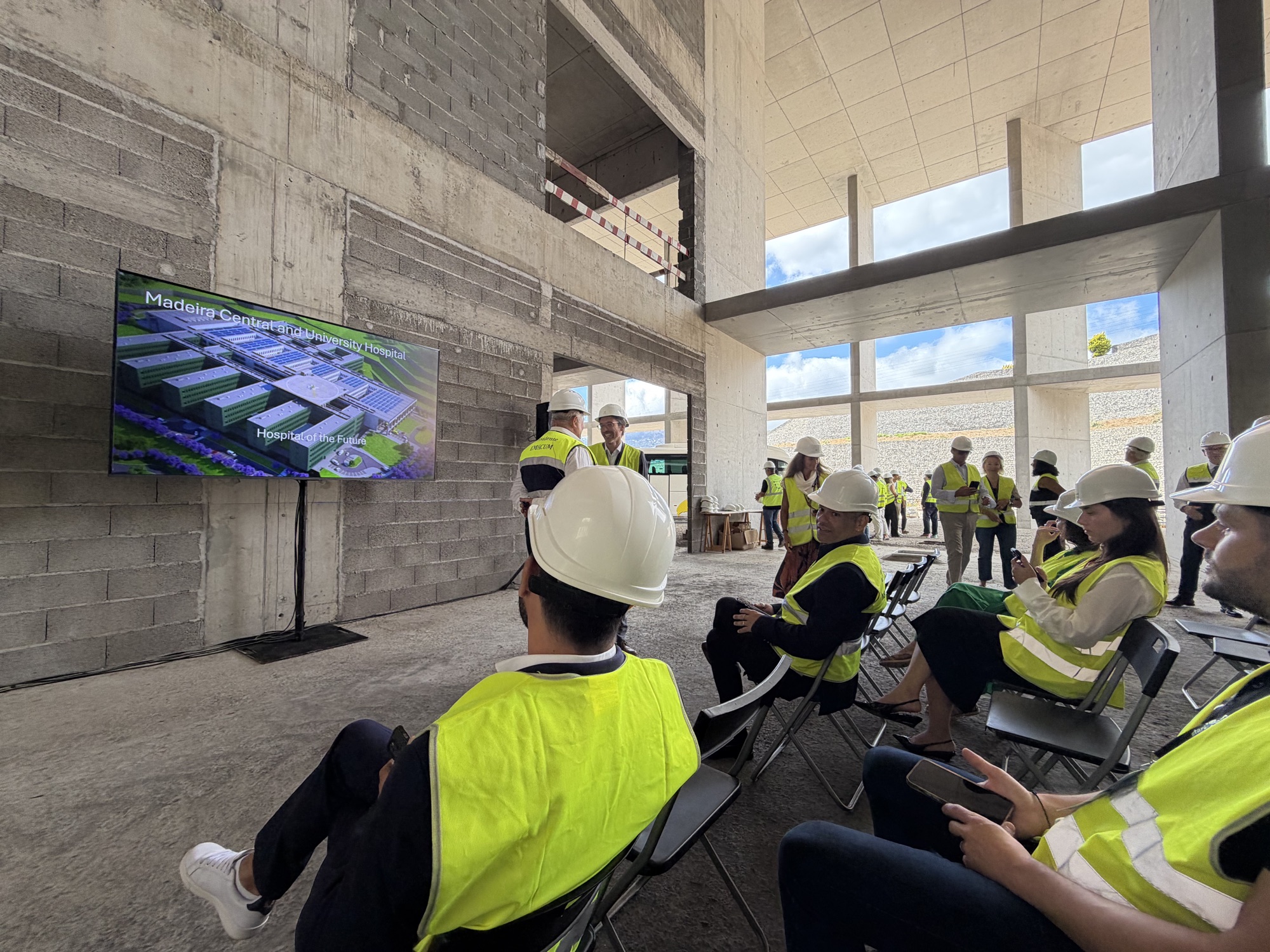 A presentation of the hospital plans at the construction site.